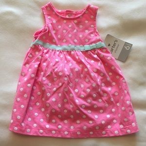 Pink dress with white polka dots